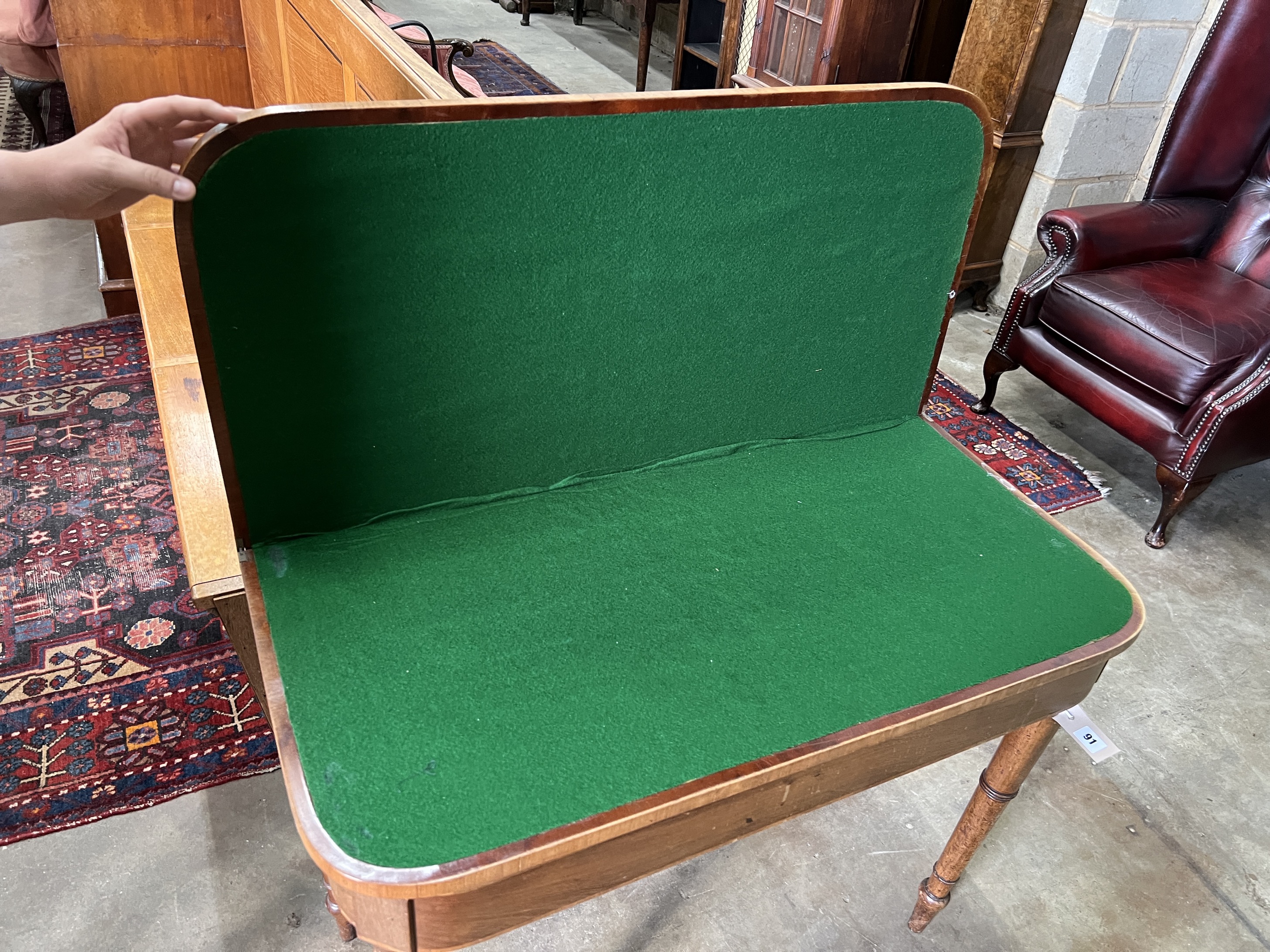 A Regency satinwood banded mahogany folding card table, width 91cm, depth 44cm, height 72cm